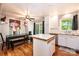Bright kitchen with stainless steel appliances, wood floors and a kitchen island at 1018 Autumn Ln, Hickory, NC 28602