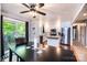 Updated kitchen and dining room combination with stainless steel refrigerator and wood floors at 1018 Autumn Ln, Hickory, NC 28602