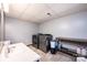 Laundry room featuring a utility sink, newer washer and dryer, and storage at 1018 Autumn Ln, Hickory, NC 28602