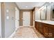 Bathroom featuring a vanity, large mirror, and tile floors offer both style and functionality at 110 Carol Lyn Dr, Kings Mountain, NC 28086