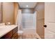 Clean bathroom with a vanity sink, toilet, and shower featuring a white shower curtain at 110 Carol Lyn Dr, Kings Mountain, NC 28086