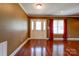 Welcoming entryway with hardwood floors, white door, and natural light from windows at 110 Carol Lyn Dr, Kings Mountain, NC 28086