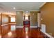 Open-concept living room with hardwood floors, neutral paint, and access to kitchen at 110 Carol Lyn Dr, Kings Mountain, NC 28086