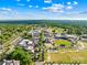 Aerial view of a cityscape with a stadium, green trees, and blue sky at 1104 Venus St, Kannapolis, NC 28083