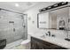 Modern bathroom featuring a glass-enclosed shower, sleek fixtures, and modern finishes creating a spa-like experience at 11216 Carmel Chace Dr, Charlotte, NC 28226