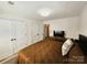 Cozy bedroom featuring a comfortable bed, complemented by ample closet space at 11216 Carmel Chace Dr, Charlotte, NC 28226
