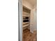 Closet with organized shelving and storage for clothing and accessories, maximizing space and functionality at 11216 Carmel Chace Dr, Charlotte, NC 28226