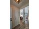 Inviting entryway with a view into the dining area, featuring hardwood floors at 11216 Carmel Chace Dr, Charlotte, NC 28226