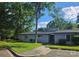 Charming single-story home with mature trees and well-maintained landscaping at 11216 Carmel Chace Dr, Charlotte, NC 28226