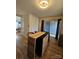 Spacious kitchen featuring an island with butcher block countertop and stainless steel appliances at 11216 Carmel Chace Dr, Charlotte, NC 28226