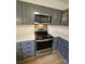 Modern kitchen features stainless steel appliances, ample cabinet space, and bright countertops at 11216 Carmel Chace Dr, Charlotte, NC 28226