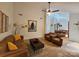 Inviting living room with a sofa, chairs, and a decorative rug, perfect for relaxation and gatherings at 11216 Carmel Chace Dr, Charlotte, NC 28226