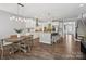 Bright and spacious kitchen with a large island, dining area, and open floor plan at 11931 The Ramble Dr, Huntersville, NC 28078