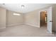 Neutral bedroom with carpeted floors and natural light filtering in, freshly painted and ready at 12224 Huntersville Concord Rd, Huntersville, NC 28078