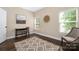 Comfortable home office space with natural light and hardwood floors, perfect for remote work at 12224 Huntersville Concord Rd, Huntersville, NC 28078