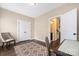 Cozy home office with closet, hardwood floors, and neutral colors, creating a tranquil workspace at 12224 Huntersville Concord Rd, Huntersville, NC 28078