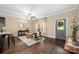Open-concept living room boasts hardwood floors, natural light and stylish decor at 12224 Huntersville Concord Rd, Huntersville, NC 28078