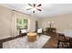 Inviting living room filled with natural light, contemporary furniture, and stylish decor at 12224 Huntersville Concord Rd, Huntersville, NC 28078
