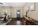 Cozy living room features hardwood floors, neutral paint, and modern furnishings at 12224 Huntersville Concord Rd, Huntersville, NC 28078