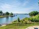 Expansive lake view from the backyard of this home, perfect for outdoor activities at 125 Mariner Pointe Ln, Mooresville, NC 28117