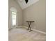 Neutral bedroom featuring a high vaulted ceiling and lots of natural light at 125 Mariner Pointe Ln, Mooresville, NC 28117