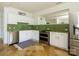 Kitchen featuring stainless steel appliances and white cabinetry at 125 Mariner Pointe Ln, Mooresville, NC 28117