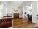 Spacious living room featuring hardwood floors, high ceilings, and an open layout, perfect for entertaining at 125 Mariner Pointe Ln, Mooresville, NC 28117