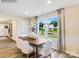 Bright dining room with a large window, wood table and seating for six at 134 Wheeler Trl, Statesville, NC 28625