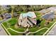 A lovely aerial view of the community clubhouse, with pool, basketball court, and playground at 1403 Rosemont Dr, Fort Mill, SC 29707