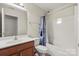 Well-lit bathroom featuring a sink, toilet, and bathtub with shower at 1403 Rosemont Dr, Fort Mill, SC 29707
