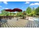 This deck features chairs and open space with mature trees surrounding the area at 1403 Rosemont Dr, Fort Mill, SC 29707