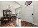 Elegant dining room with hardwood floors, chandelier, and classic furniture, perfect for formal gatherings at 1403 Rosemont Dr, Fort Mill, SC 29707