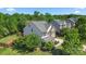 Charming home features a well-maintained lawn and lush landscaping at 1403 Rosemont Dr, Fort Mill, SC 29707