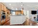 Open kitchen featuring stainless appliances, granite counters, breakfast bar, and seamless access to living spaces at 1403 Rosemont Dr, Fort Mill, SC 29707