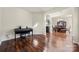 Spacious living room featuring hardwood floors, neutral walls, and ample natural light at 1403 Rosemont Dr, Fort Mill, SC 29707