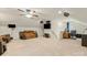 Large living room featuring couches, chairs, ceiling fan, and television at 1403 Rosemont Dr, Fort Mill, SC 29707