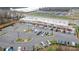 An aerial view of the commercial parking lot, featuring stores with a parking lot at 1403 Rosemont Dr, Fort Mill, SC 29707