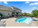 Enjoy the backyard with an in-ground pool and covered patio, perfect for entertaining outdoors at 1403 Rosemont Dr, Fort Mill, SC 29707