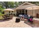 Spacious backyard patio with outdoor dining and lounging areas, ideal for entertaining at 1427 Worcaster Pl, Charlotte, NC 28211