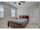 Cozy bedroom with neutral walls, ceiling fan, carpeted floor and natural light at 15108 Montage Ln, Charlotte, NC 28278