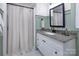 Bathroom features a granite countertop and a shower with a curtain at 1514 Wensley Dr, Charlotte, NC 28210