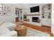 Bright living room with a whitewashed brick fireplace at 1514 Wensley Dr, Charlotte, NC 28210