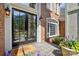 Inviting entryway showcases a black multi-paneled front door, sidelight window, and neutral decor at 16216 Woolwine Rd, Charlotte, NC 28278