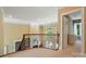 Bright hallway featuring a railing that looks over a spacious living room at 16216 Woolwine Rd, Charlotte, NC 28278