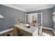 Elegant home office with French doors, custom desk, and sophisticated decor at 16216 Woolwine Rd, Charlotte, NC 28278