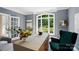 Stylish office space with custom desk, elegant decor, and natural light at 16216 Woolwine Rd, Charlotte, NC 28278