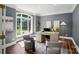 Bright office featuring a large window, modern desk, and comfortable seating at 16216 Woolwine Rd, Charlotte, NC 28278