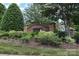 Neighborhood entrance featuring a brick sign for Village of St Andrews at 2114 N Castle Ct, Matthews, NC 28105