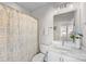 Clean bathroom with a shower/tub combo and a marble-like vanity at 2123 Bryant Park Dr, Charlotte, NC 28208