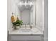 Well-lit powder room features a modern vanity with a stylish mirror and fixtures at 2123 Bryant Park Dr, Charlotte, NC 28208